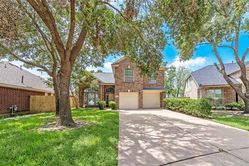 Extra long driveway and 2-car garage.