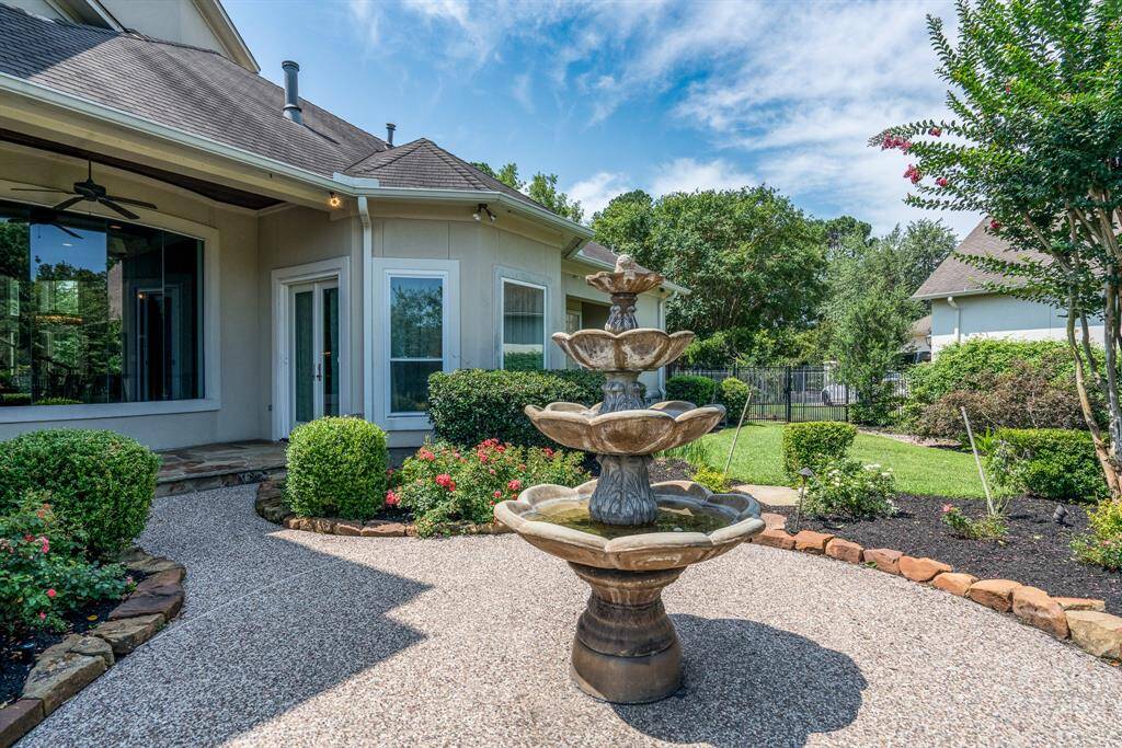 Extensive lush gardens is one of the highlights of this home.