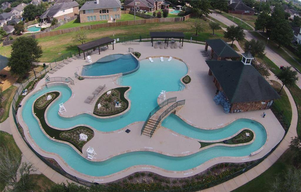 ...three pool complexes including this recently completed lazy river. There are swim team meets at another of the subdivision's pools.