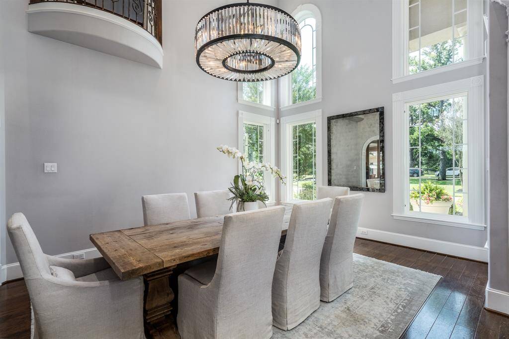 Elegant dining space can accommodate several guests and furniture pieces.