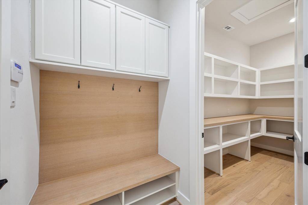 Mud Room and view of Kitchen Pantry