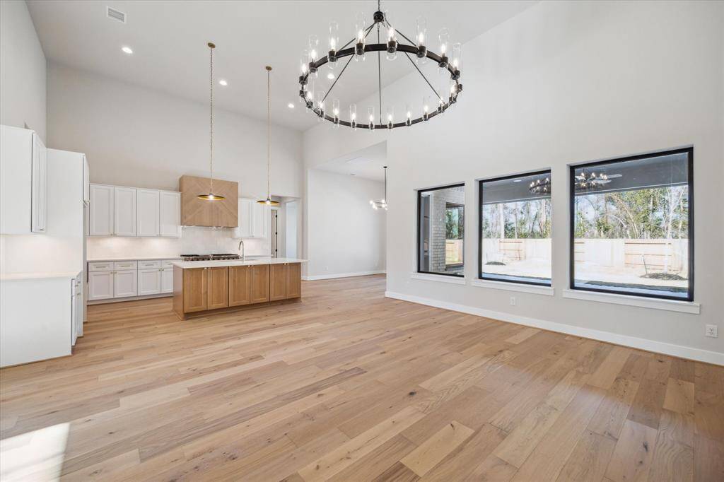 Living Area flows to Kitchen and informal Dining