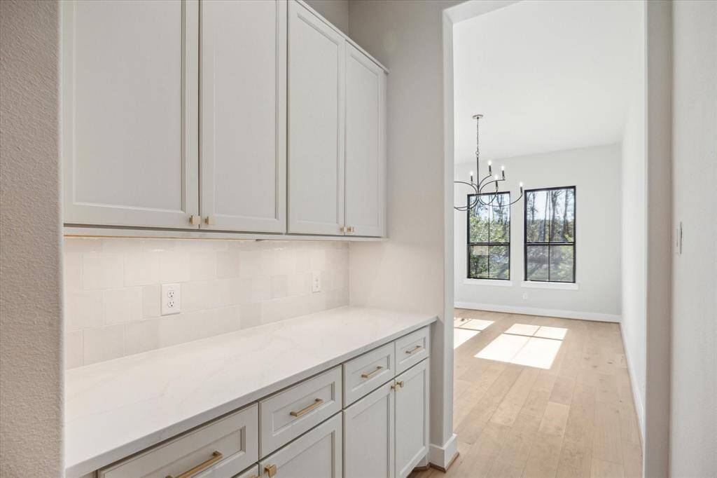 Butler's Pantry connects Formal Dining Room and Kitchen