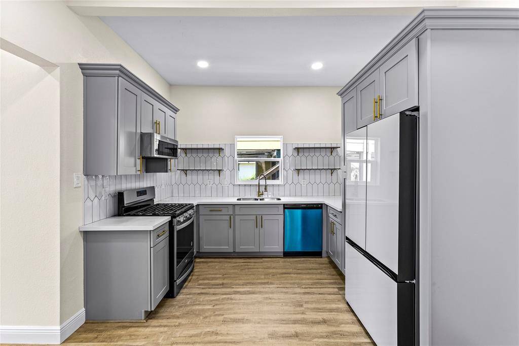 Updated kitchen for 5908 Avenue T 1/2. Three bedroom two bathroom bungalow