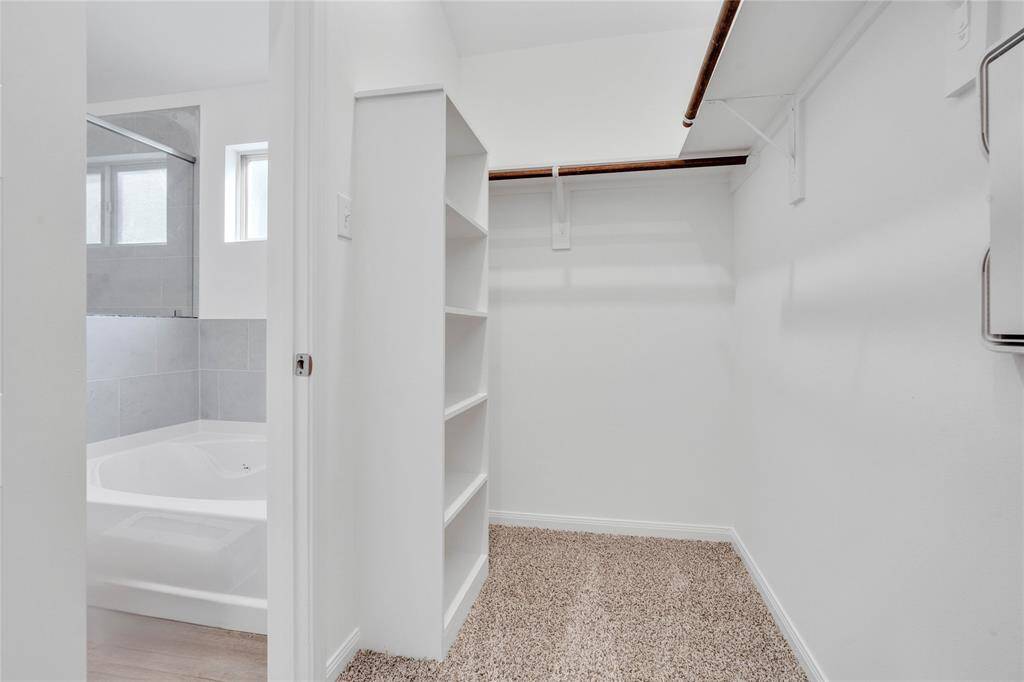 The walk-in closet will not disappoint with high shelving, multiple rows to hang clothing, you are sure to have enough room for all your belongings!