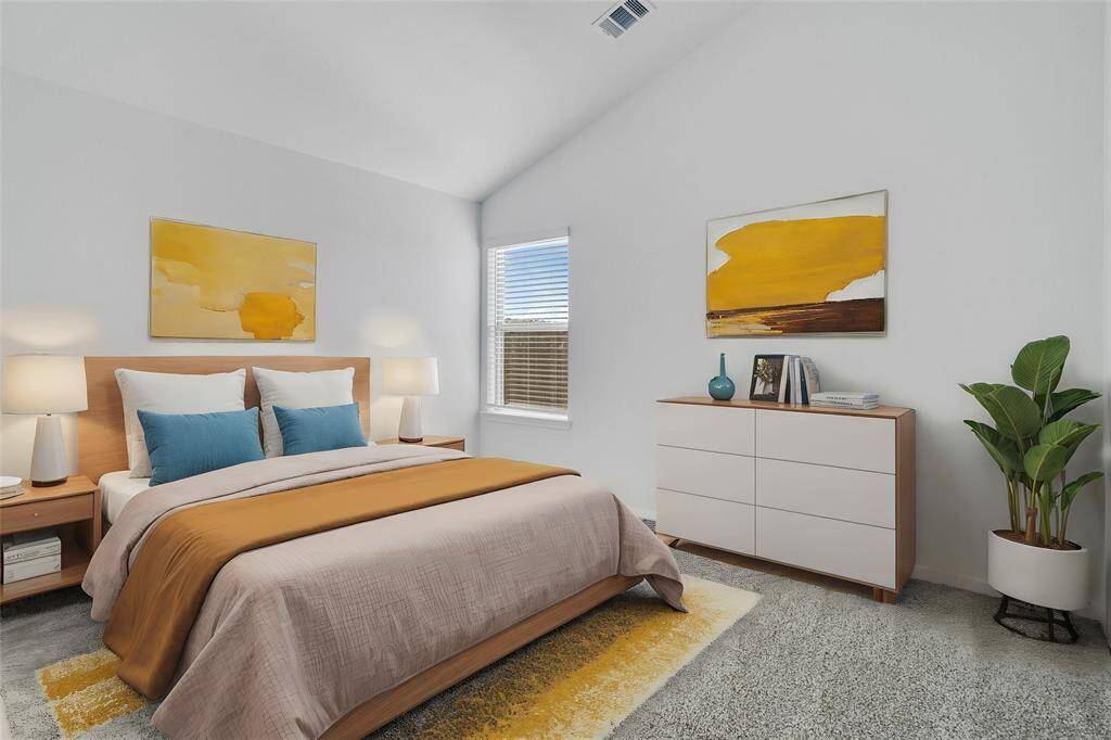 Secondary bedroom features plush carpet, neutral paint, high ceilings, and a large window with privacy blinds. *virtually staged*