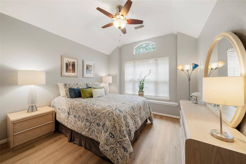 Beautiful secondary bedroom with huge picture window seat.