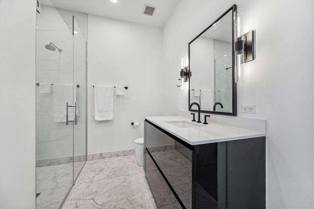 Secondary Bathroom plus large walk in closet.