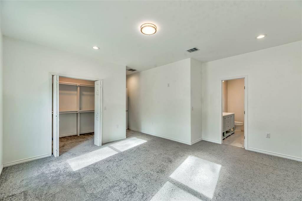 MASTER BEDROOM, WALK IN CLOSET WITH BUILT IN CABINETS