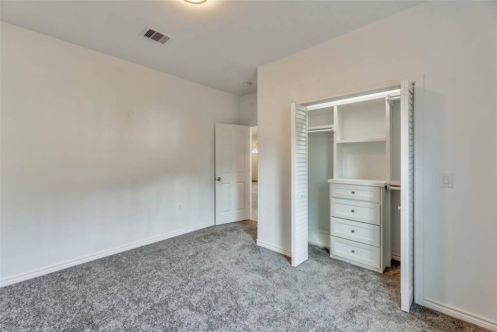 1 OF 3 BEDROOMS,WALK IN CLOSET WITH BUILT IN CABINETS
