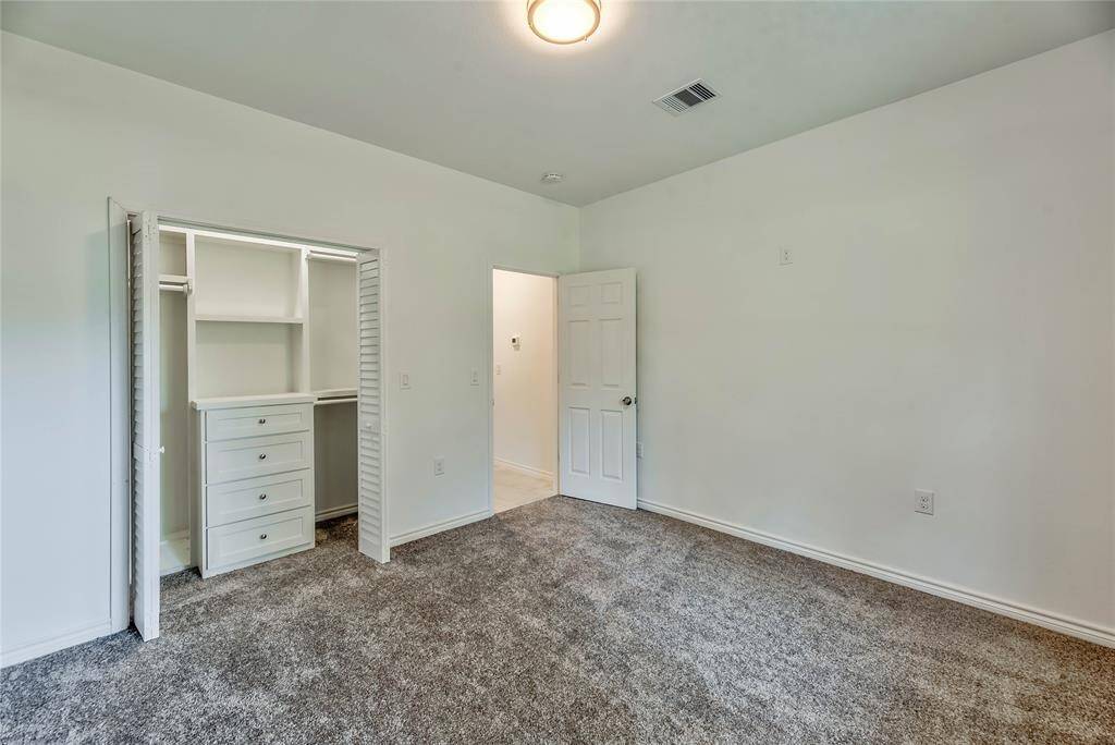 1 OF 3 BEDROOMS,WALK IN CLOSET WITH BUILT IN CABINETS