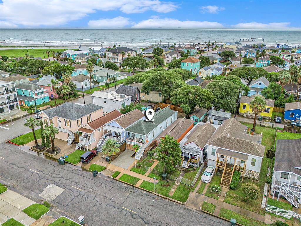 Aerial view facing southeast towards the Seawall, and Gulf of Mexico.