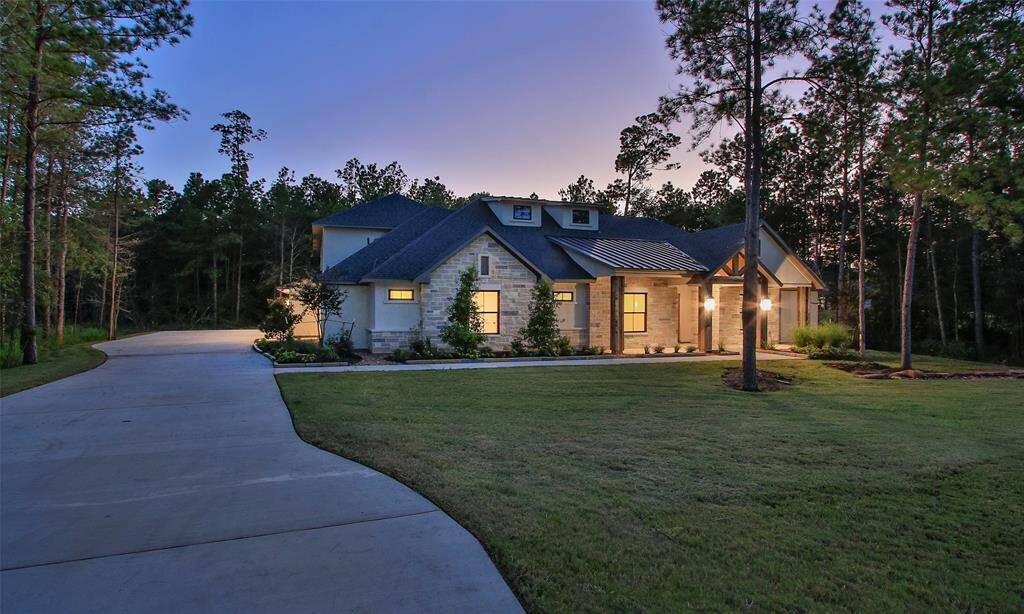 Stunning sunset picture of this spacious house nestled on 1.484+/- acres. Long driveway for extra parking if needed.