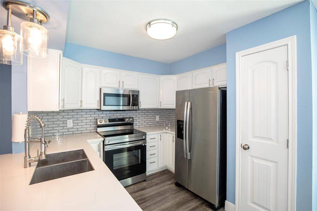 The kitchen has been beautifully updated.