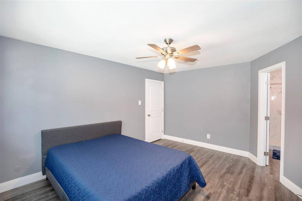 The primary bedroom has enough space for king size furniture.