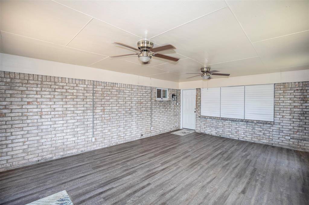 The patio has two ceiling fans.  This fantastic bonus space would make a wonderful game room.