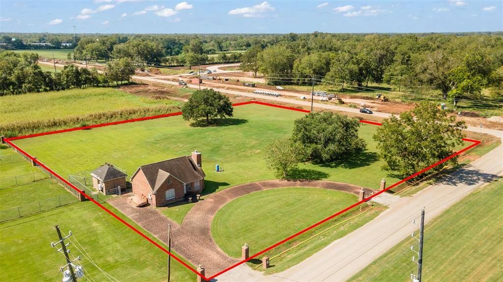 900 sqft. home with the additional acreage to build on.