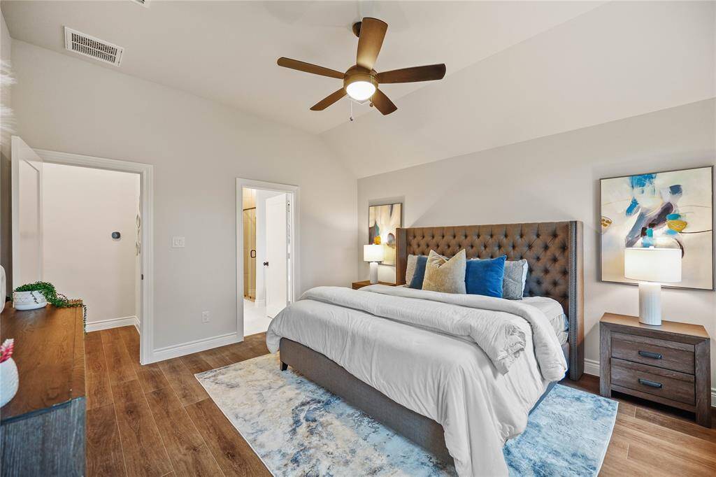 Oversized Master Bedroom showing a king size bed.