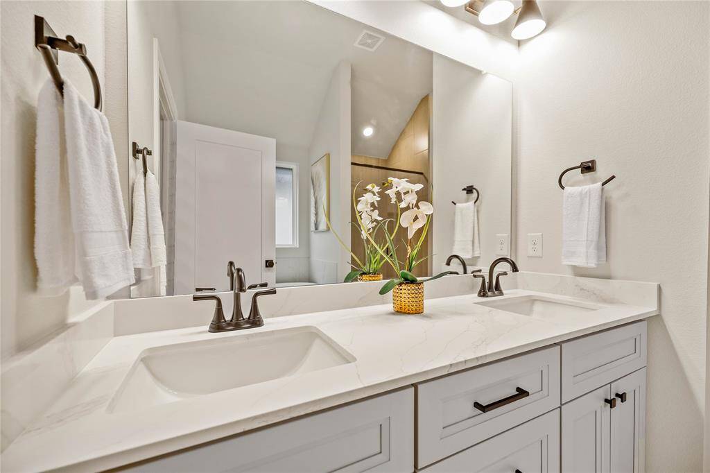 Master Bath Vanity with quartz countertops, undermount sink, and black plumbing, cabinet & door hardware