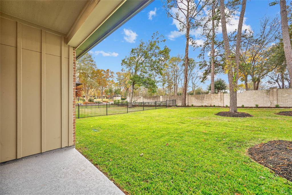 Oversized backyard with mature trees.   Sit out on your patio and enjoy the views of the golf course.