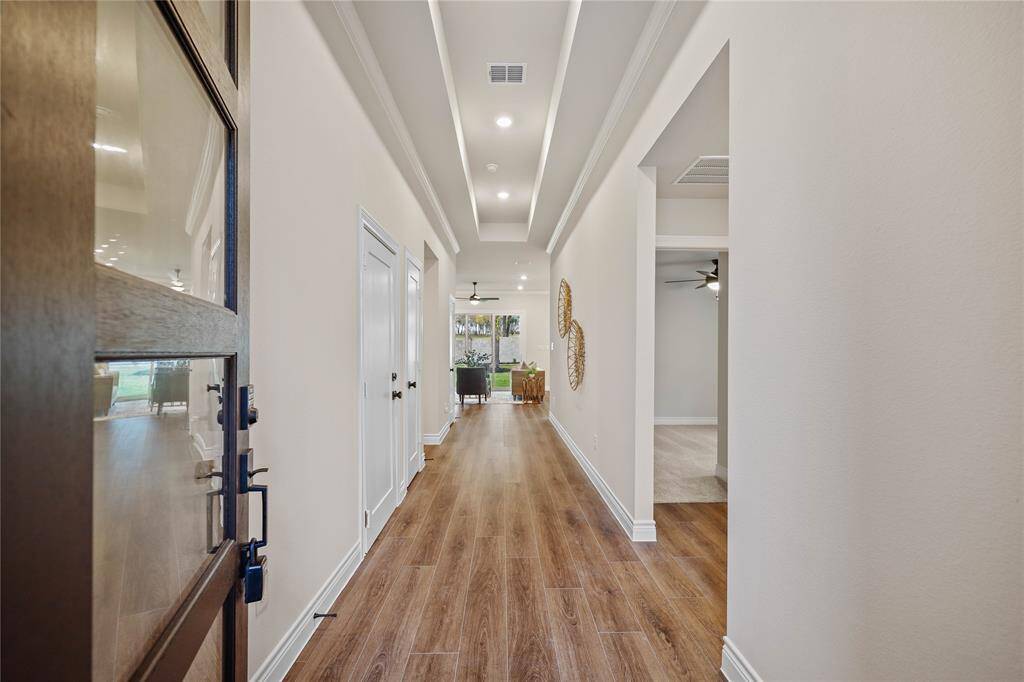 High Ceilings throughout main area and primary suite.