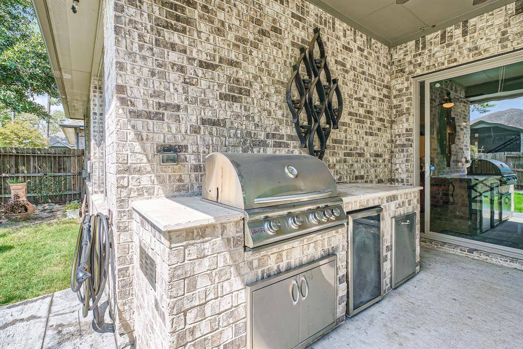 Outdoor kitchen for gathering outside while preparing meals
