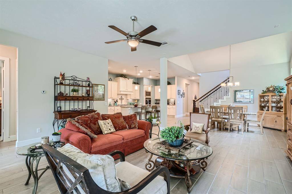 The open living, dining, kitchen areas enhances your gatherings with family or friends.