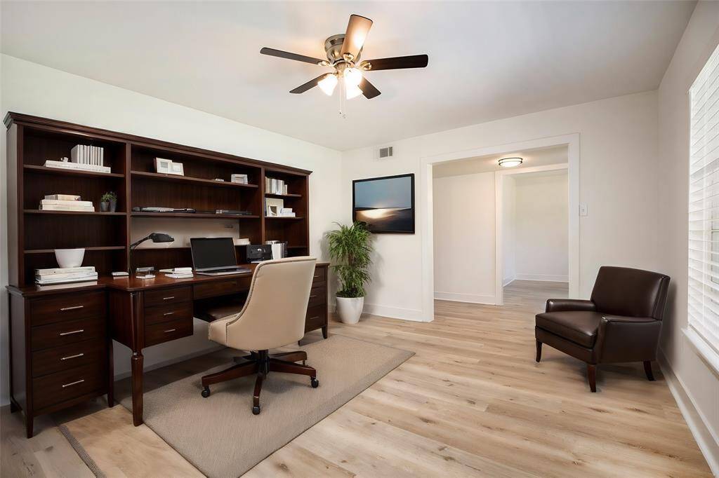 VIrtually staged as a home office.