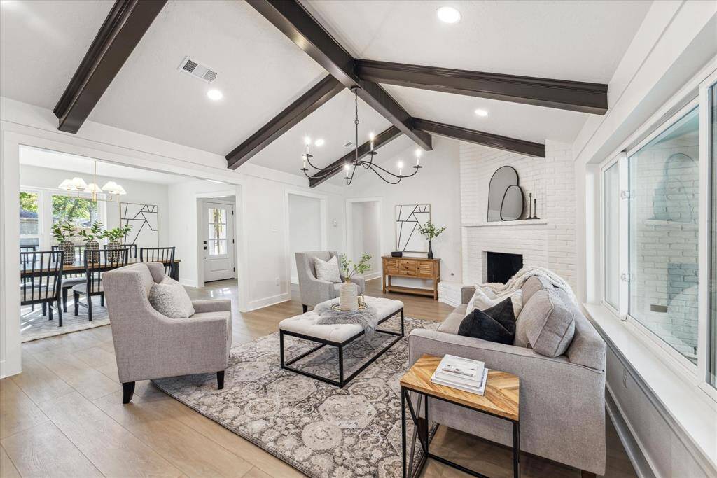 THE FAMILY ROOM BOASTS VAULTED CEILING WITH RICH WOOD BEAMS. JUST STUNNING!