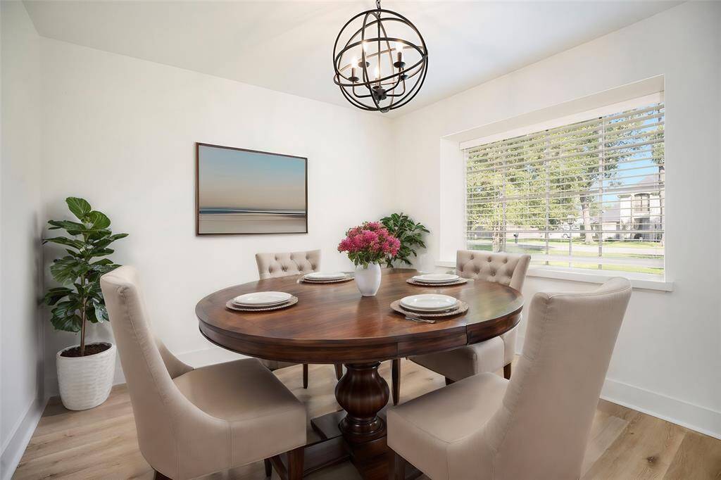 Virtually staged dining room right off the kitchen.