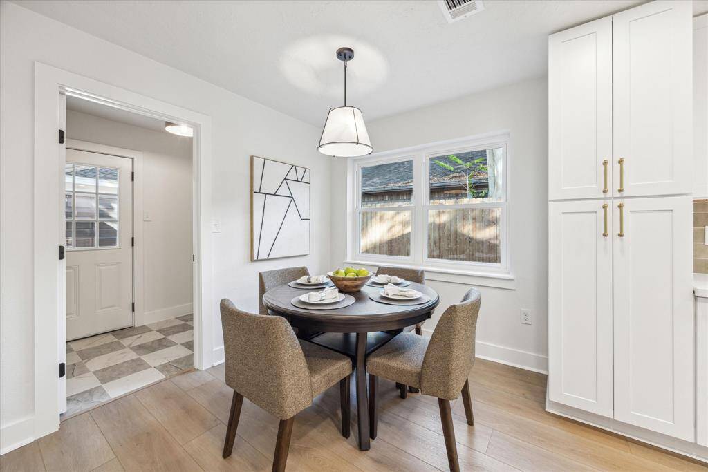 THE BREAKFAST AREA HAS ACCESS TO THE BACKDOOR, MUD AREA AND LAUNDRY ROOM.