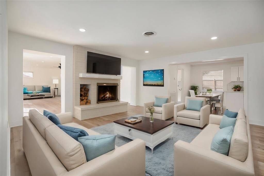 Elegantly Staged Living Area with Fireplace
