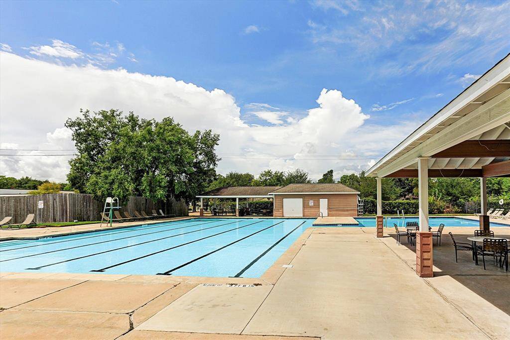 THE COMMUNITY POOL OFFERS A JUNIOR OLYMPIC POOL AND A RESORT PLUNGE POOL.