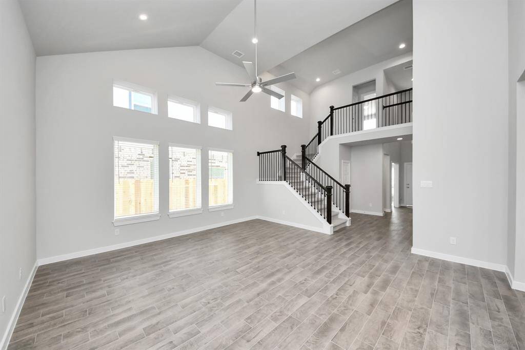 Take another glimpse into the heart of the home with this additional view of the family room—a sprawling space ready to accommodate all your gatherings.