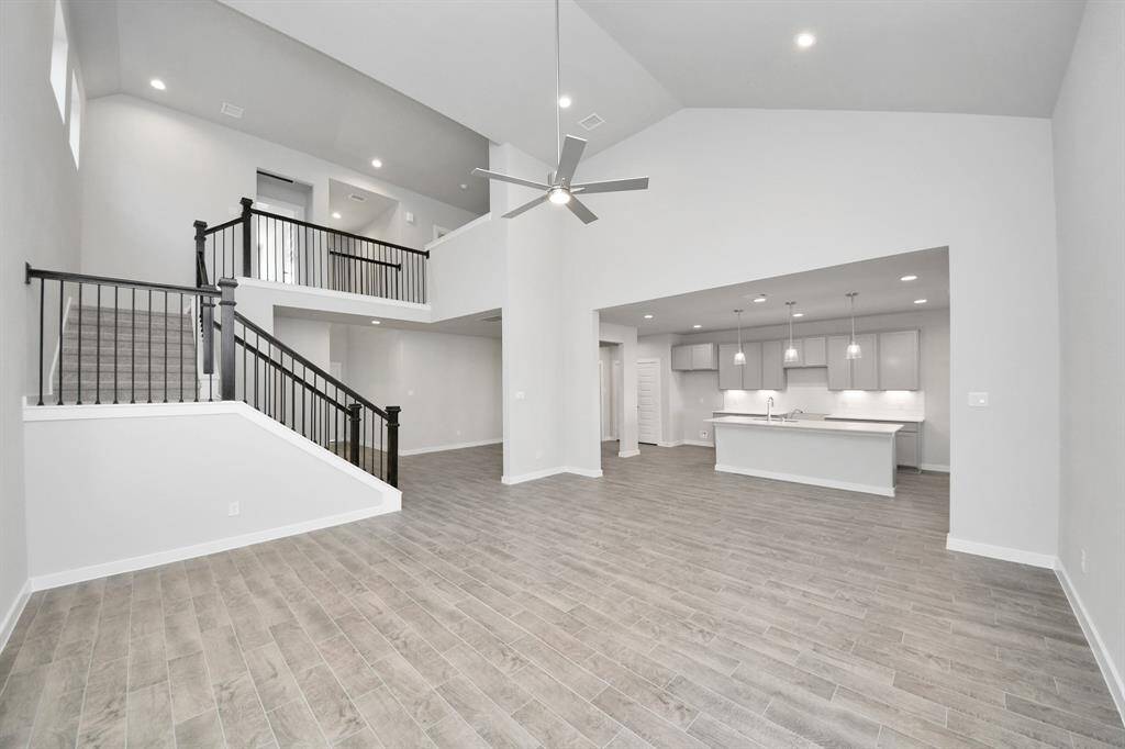 A perfect blend of functionality and comfort. Capture the essence of easy living with a first-floor laundry room, thoughtfully equipped with shelving for effortless organization. Both electric and gas connections available.