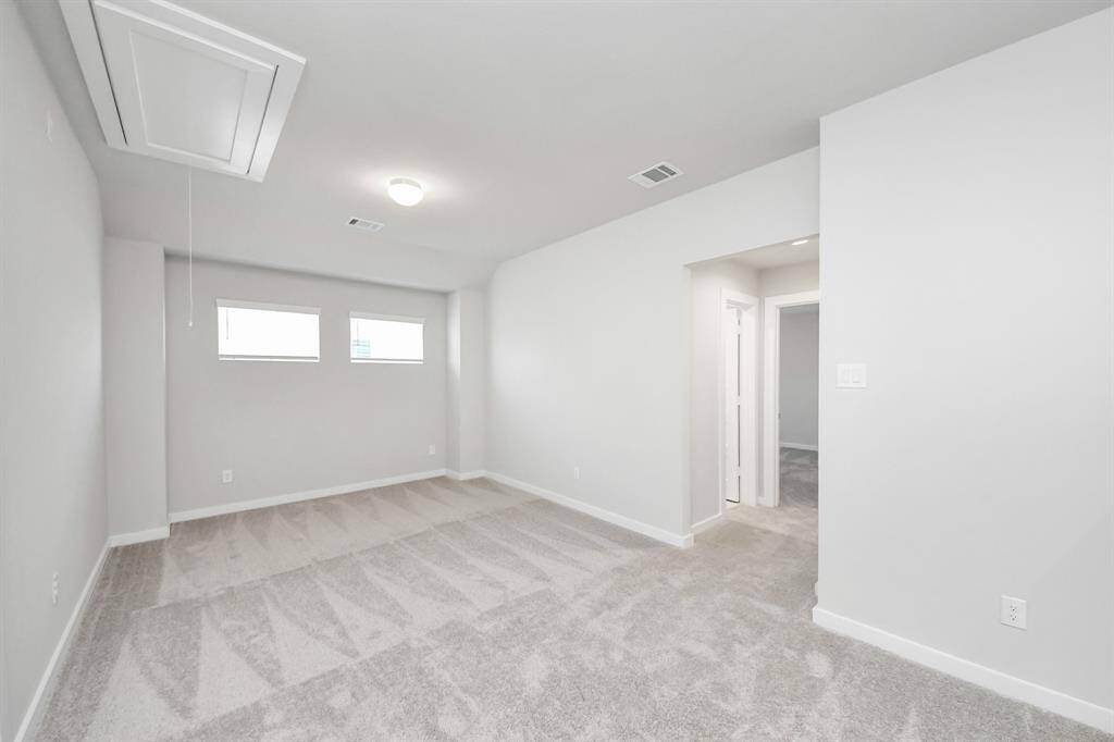 Discover another perspective of this spacious gameroom.
