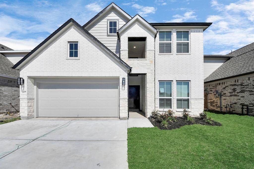 An aerial view of a spacious subdivision lot, highlighting a well-maintained yard and a fully fenced perimeter, offering both privacy and expansive outdoor space.