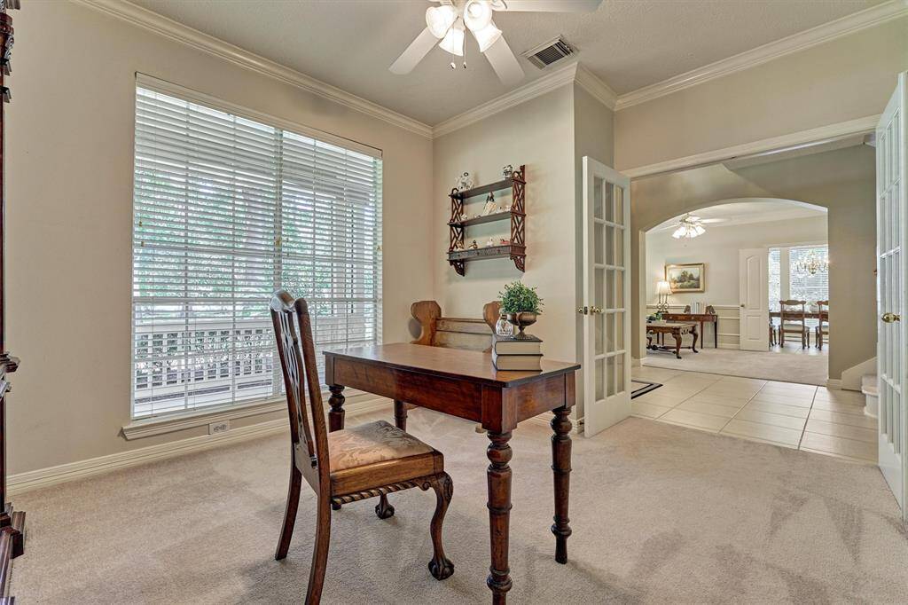 Office looks across the foyer to the formal living room