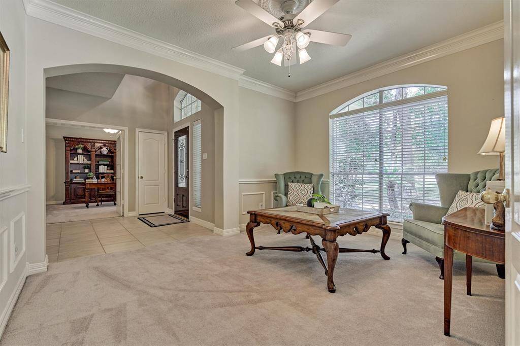 Formal living room with elegant molding