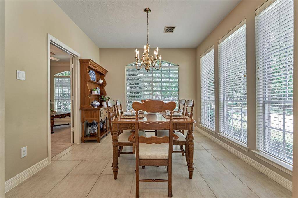 Formal dining room allows plenty of natural light