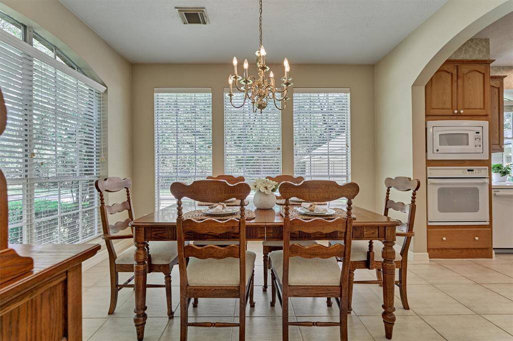 Formal dining room allows plenty of natural light