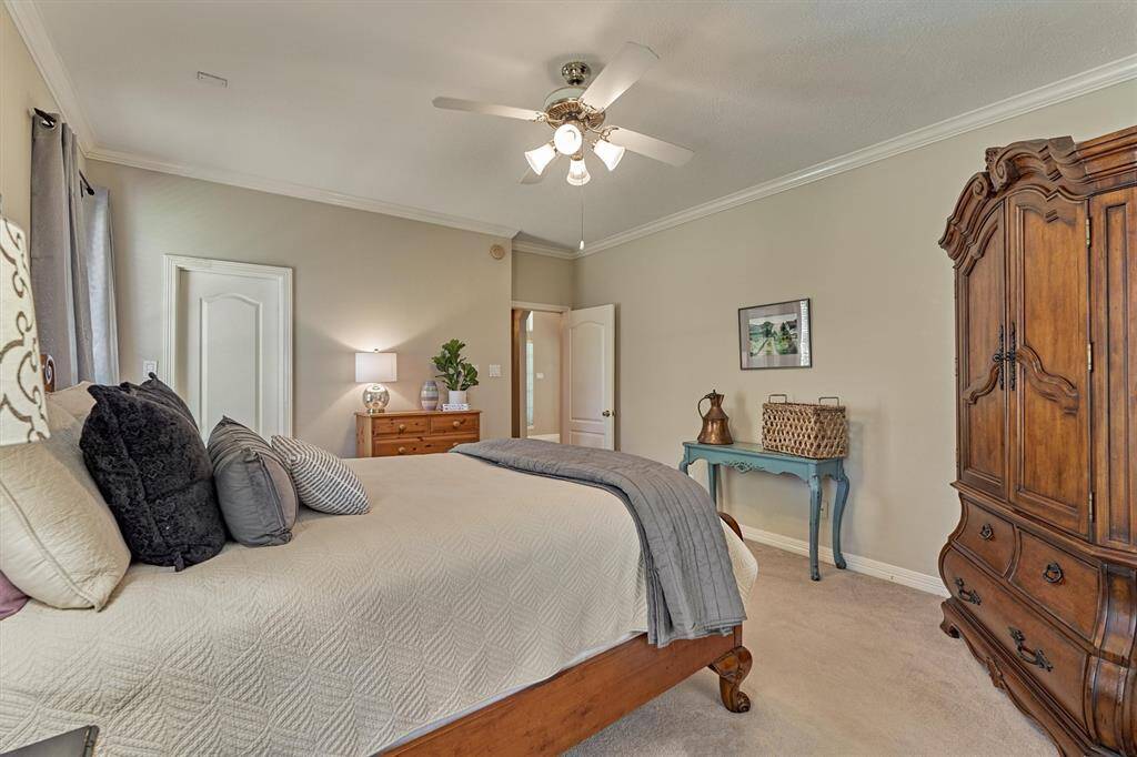 Primary bedroom offers an additional closet