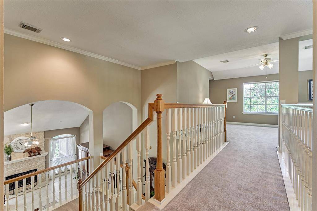 Upstairs staircase landing/balcony