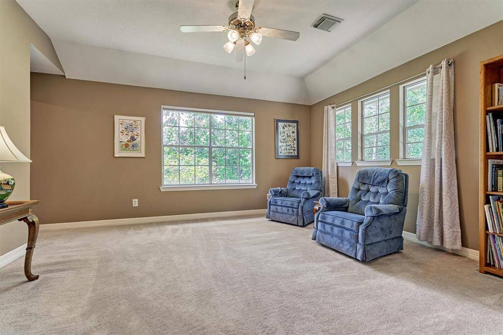 Upstairs gameroom offers another living space