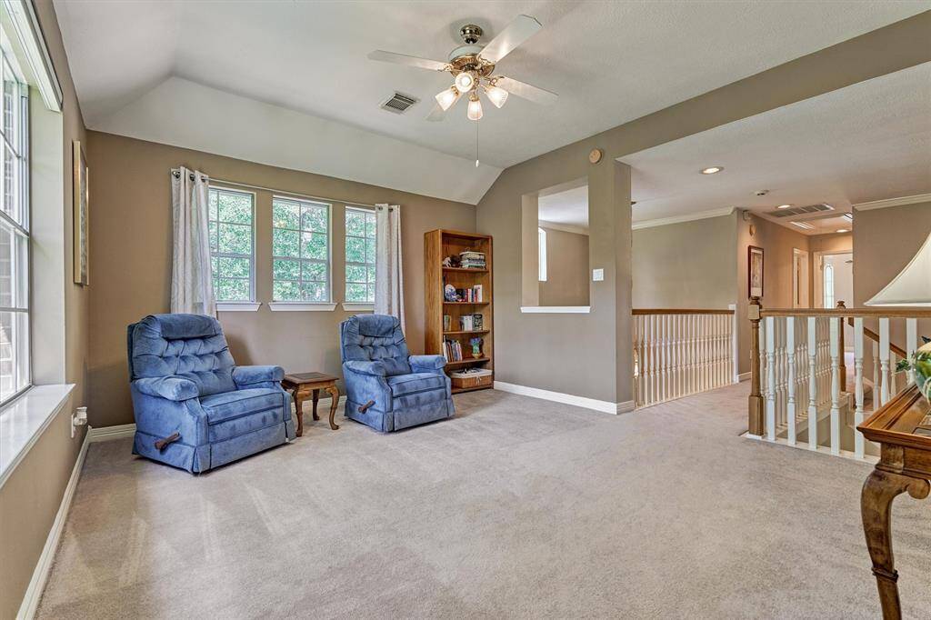 Upstairs gameroom offers another living space