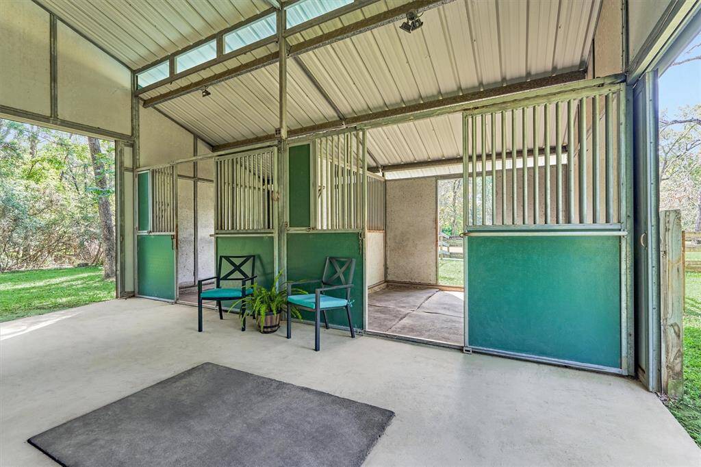 Barnmaster barn with 2 stalls, tack room, hay/storage area, and walk-outs