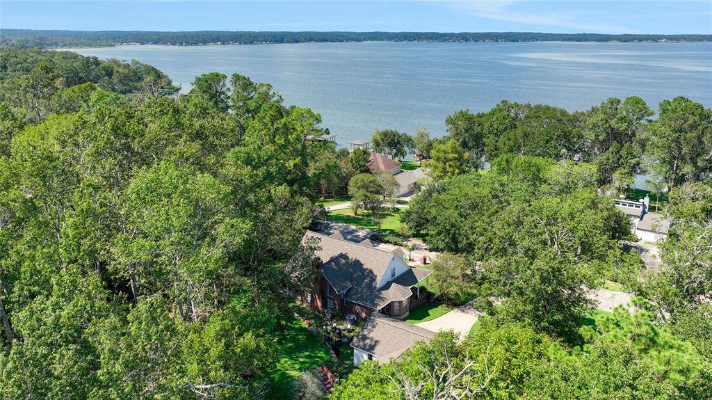Across the street from Lake Livingston and close to the community boat ramp