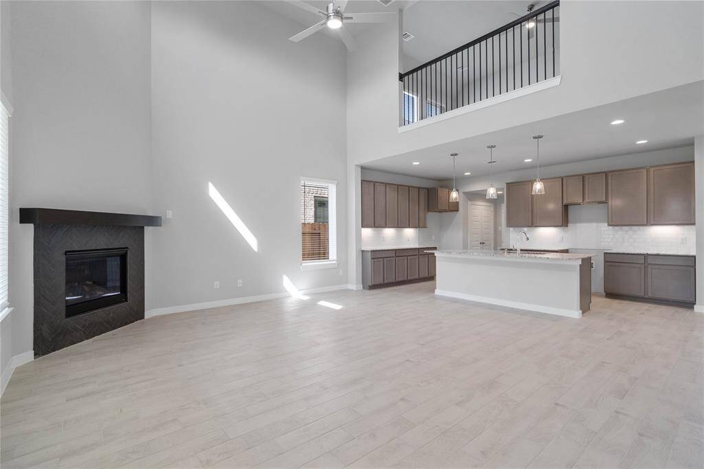 Another view from the family room looking into the kitchen and second floor space!