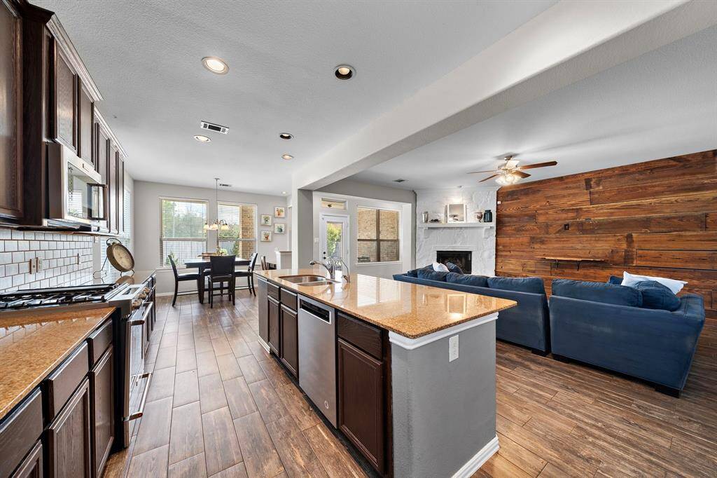 The kitchen overlooks the living room, making this an open floor plan.