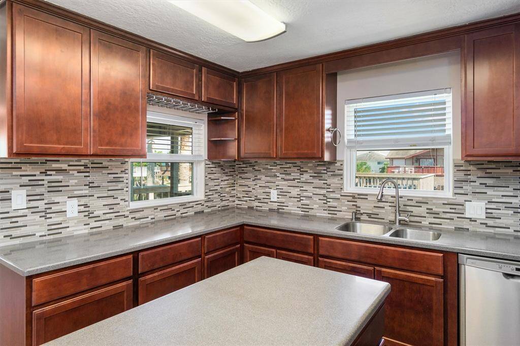 Lots of natural lighting in the kitchen. The kitchen window overlooks the water and there's plenty of cabinets and counter space